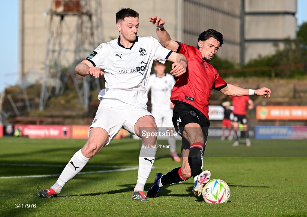 6 April 2026; Hayden Cann of Waterford in action against Connor Parsons of Bohemians during the SSE Airtricity Men's Premier Division match between Bohemians and Waterford at Dalymount Park in Dublin. Photo by Paul Phelan/Sportsfile