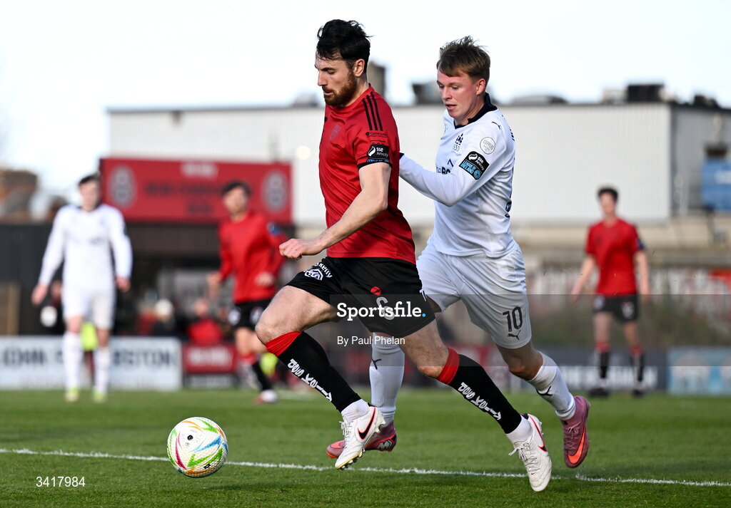 6 April 2026; Jordan Flores of Bohemians in action against Conan Noonan of Waterford during the SSE Airtricity Men's Premier Division match between Bohemians and Waterford at Dalymount Park in Dublin. Photo by Paul Phelan/Sportsfile