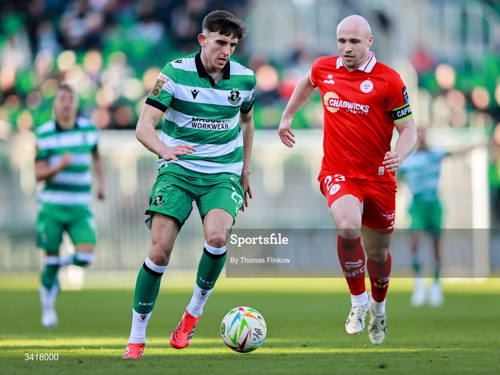 6 April 2026; John O'Sullivan of Shamrock Rovers in action against Kerr McInroy of Shelbourne during the SSE Airtricity Men's Premier Division match between Shamrock Rovers and Shelbourne at Tallaght Stadium in Dublin. Photo by Thomas Flinkow/Sportsfile