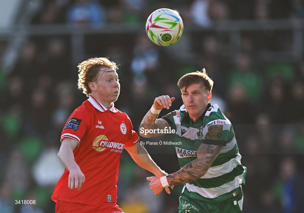 6 April 2026; Jack Henry-Francis of Shelbourne in action against Danny Grant of Shamrock Rovers during the SSE Airtricity Men's Premier Division match between Shamrock Rovers and Shelbourne at Tallaght Stadium in Dublin. Photo by Piaras Ó Mídheach/Sportsfile
