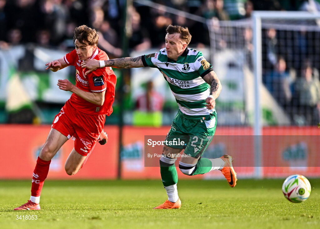 6 April 2026; Danny Grant of Shamrock Rovers pulls Daniel Kelly of Shelbourne back to stop him on an attack, before being shown a yellow card, during the SSE Airtricity Men's Premier Division match between Shamrock Rovers and Shelbourne at Tallaght Stadium in Dublin. Photo by Piaras Ó Mídheach/Sportsfile
