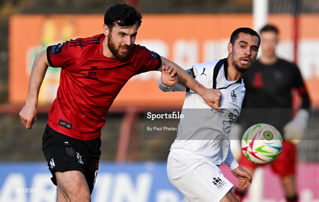 6 April 2026; Jordan Flores of Bohemians in action against Jordan Faria of Waterford during the SSE Airtricity Men's Premier Division match between Bohemians and Waterford at Dalymount Park in Dublin. Photo by Paul Phelan/Sportsfile