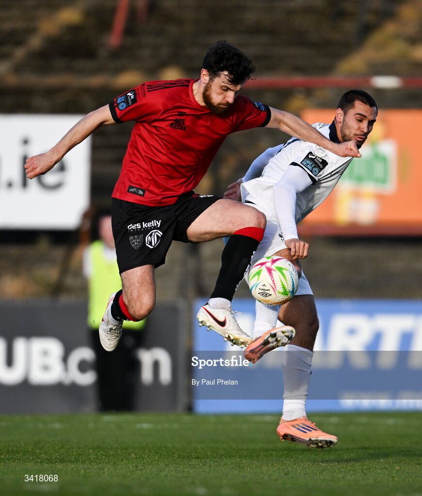 6 April 2026; Jordan Flores of Bohemians in action against Jordan Faria of Waterford during the SSE Airtricity Men's Premier Division match between Bohemians and Waterford at Dalymount Park in Dublin. Photo by Paul Phelan/Sportsfile