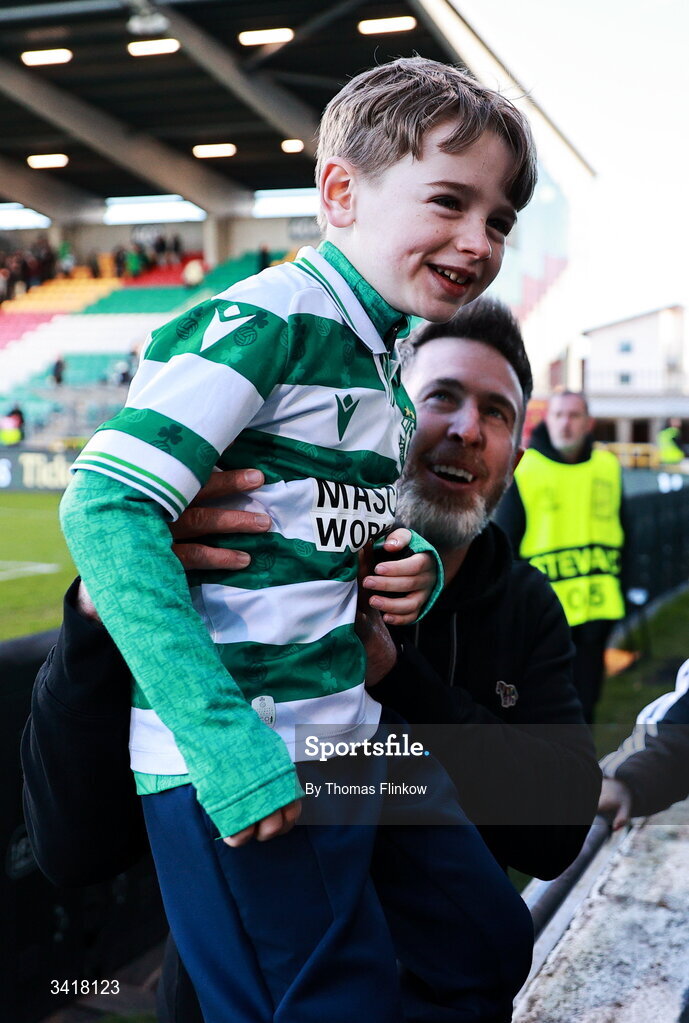 6 April 2026; Shamrock Rovers manager Stephen Bradley with a young supporter after his side's victory in the SSE Airtricity Men's Premier Division match between Shamrock Rovers and Shelbourne at Tallaght Stadium in Dublin. Photo by Thomas Flinkow/Sportsfile