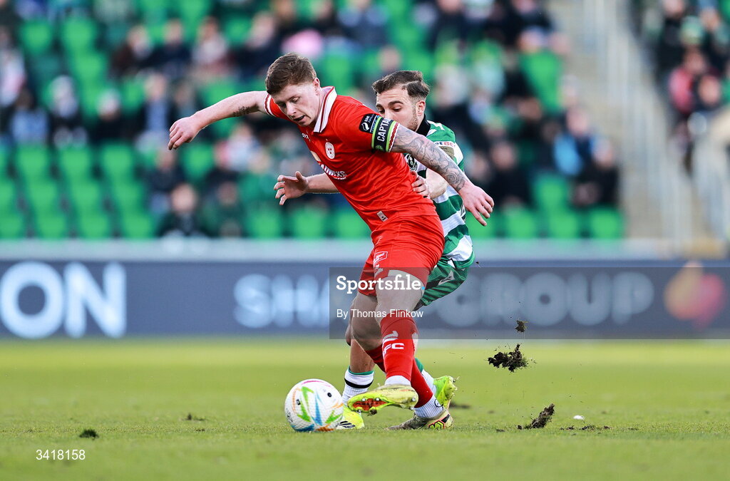 6 April 2026; Kameron Ledwidge of Shelbourne in action against Najemedine Razi of Shamrock Rovers during the SSE Airtricity Men's Premier Division match between Shamrock Rovers and Shelbourne at Tallaght Stadium in Dublin. Photo by Thomas Flinkow/Sportsfile