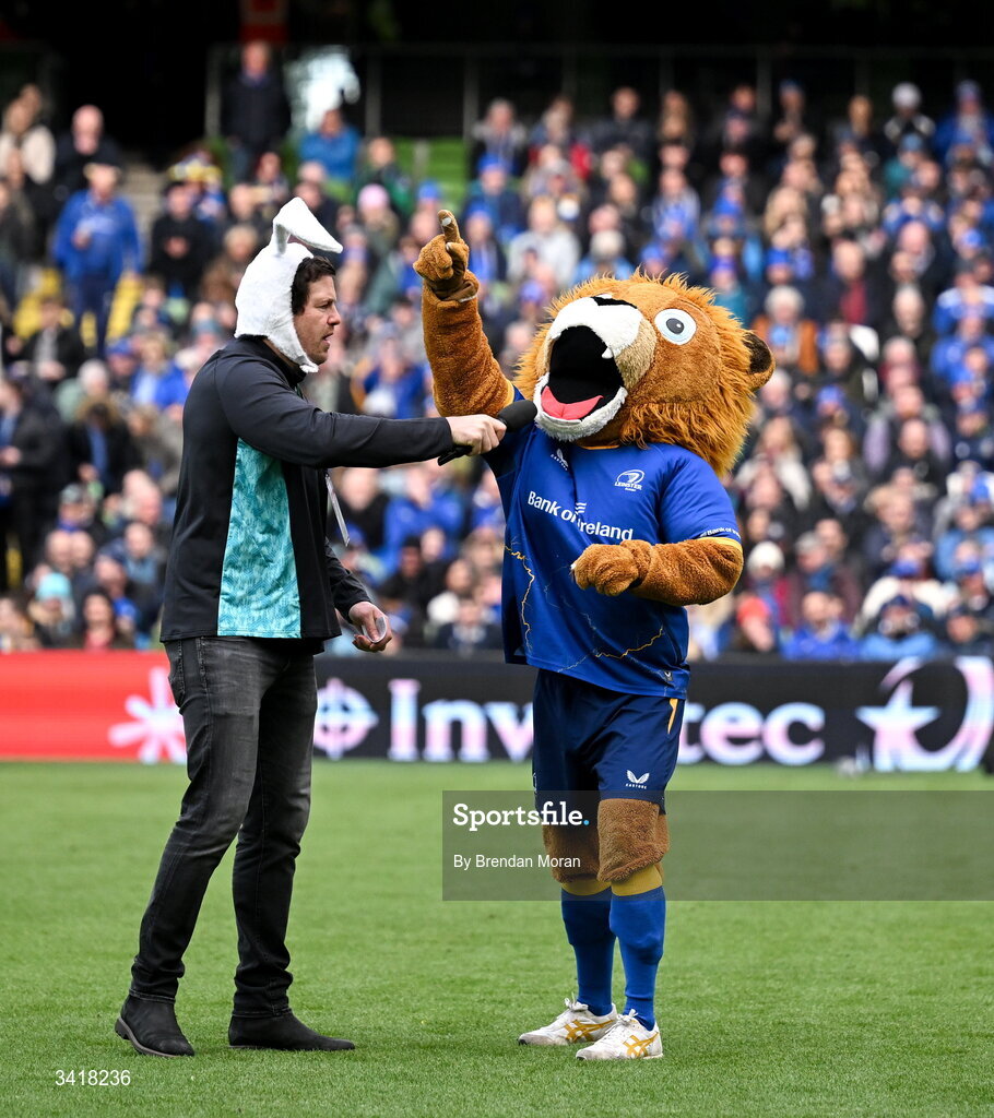 5 April 2026; MC Mike McCarthy with Leo the Lion before the Investec Champions Cup match between Leinster and Edinburgh at the Aviva Stadium in Dublin. Photo by Brendan Moran/Sportsfile