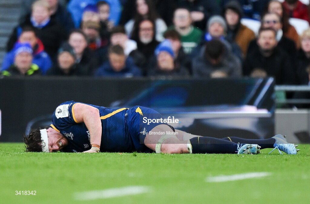 5 April 2026; Ryan Baird of Leinster lies injured before receiving medical attention during the Investec Champions Cup match between Leinster and Edinburgh at the Aviva Stadium in Dublin. Photo by Brendan Moran/Sportsfile