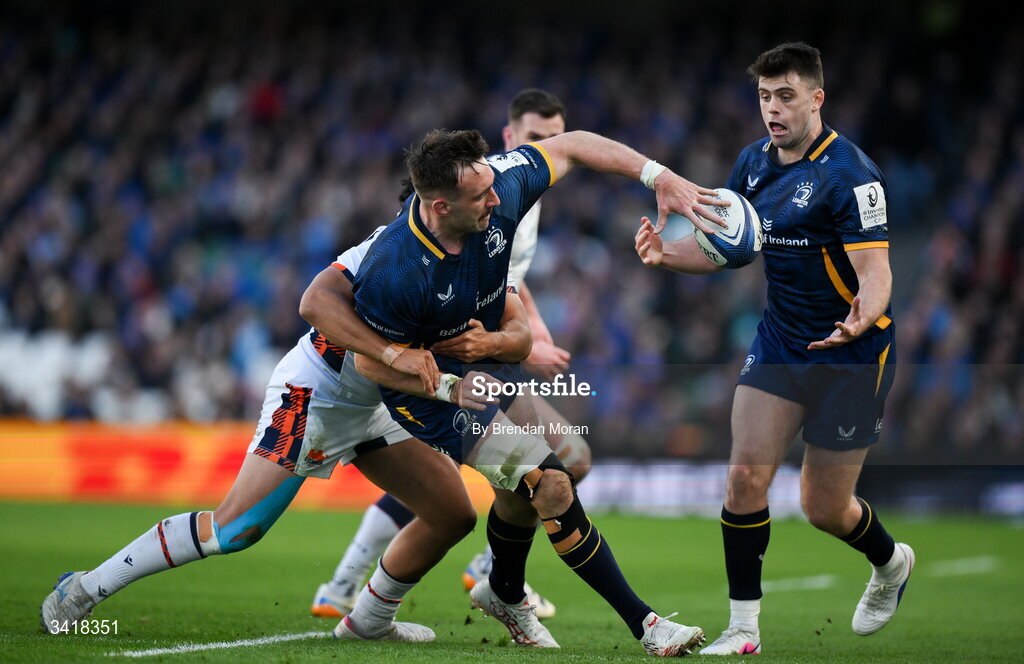 5 April 2026; Jack Conan of Leinster offloads to teammate Harry Byrne during the Investec Champions Cup match between Leinster and Edinburgh at the Aviva Stadium in Dublin. Photo by Brendan Moran/Sportsfile