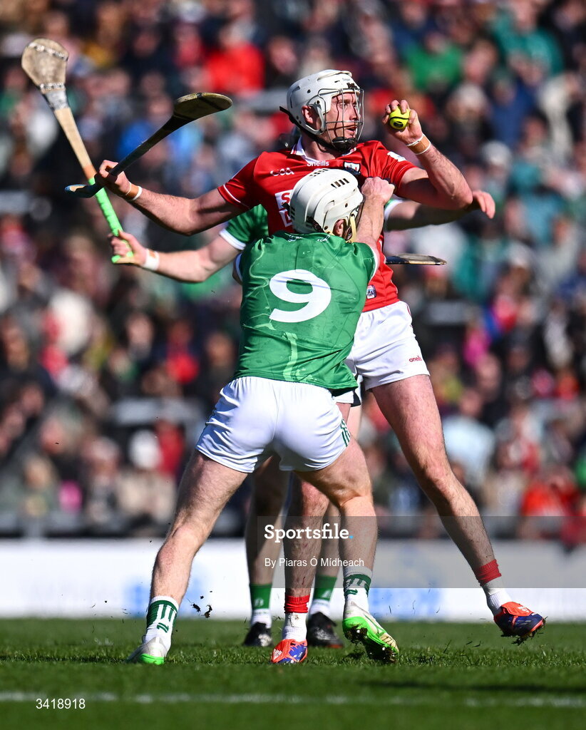 5 April 2026; Tim O'Mahony of Cork in action against Cian Lynch of Limerick during the Allianz Hurling League Division 1A final match between Limerick and Cork at TUS Gaelic Grounds in Limerick. Photo by Piaras Ó Mídheach/Sportsfile