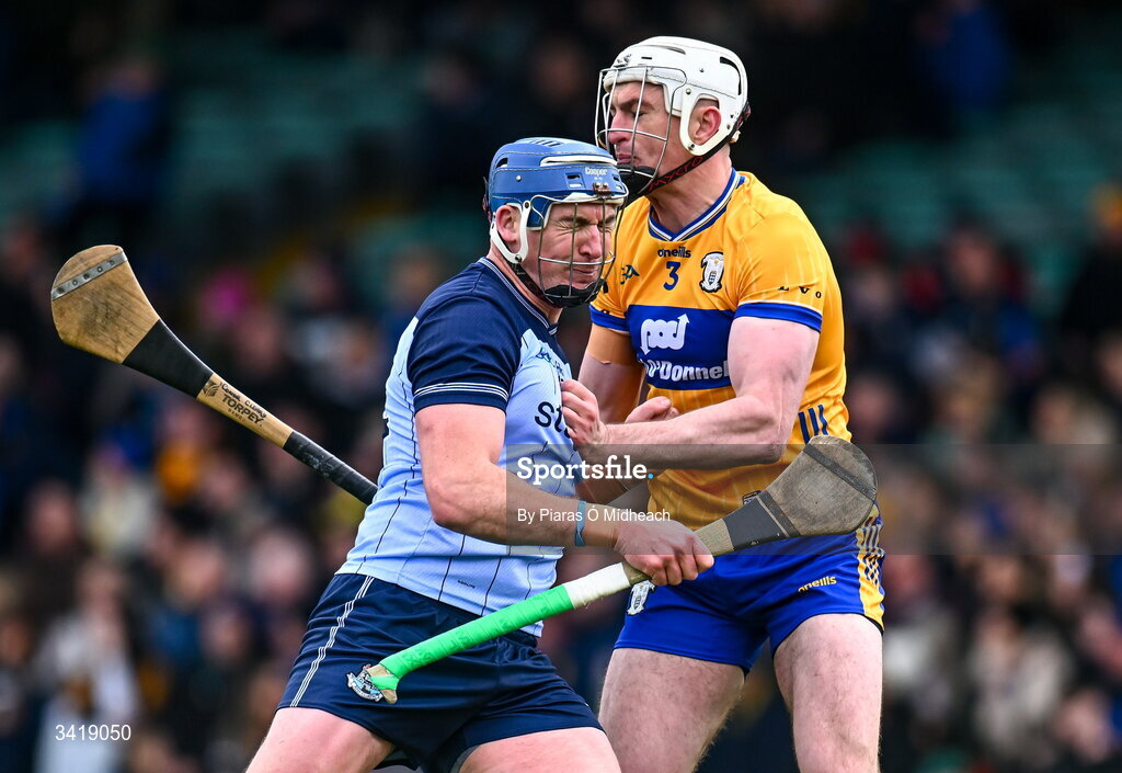 5 April 2026; John Hetherton of Dublin and Conor Cleary of Clare tussle off the ball during the Allianz Hurling League Division 1B final match between Clare and Dublin at TUS Gaelic Grounds in Limerick. Photo by Piaras Ó Mídheach/Sportsfile