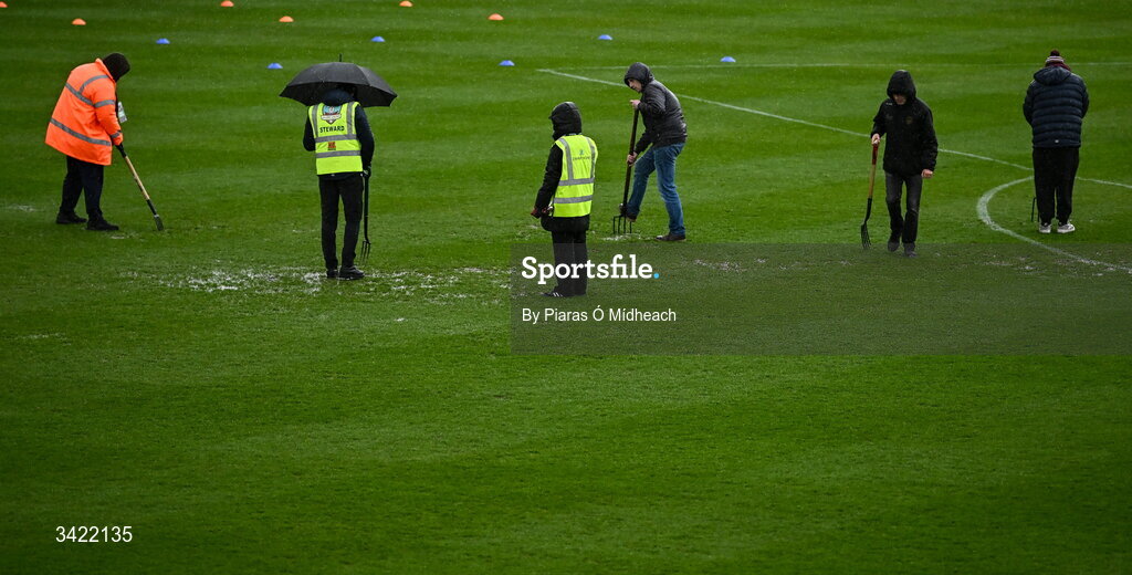 10 April 2026; Galway United club officials tend to the wet pitch before the SSE Airtricity Men's Premier Division match between Galway United and Shelbourne at Eamonn Deacy Park in Galway. Photo by Piaras Ó Mídheach/Sportsfile