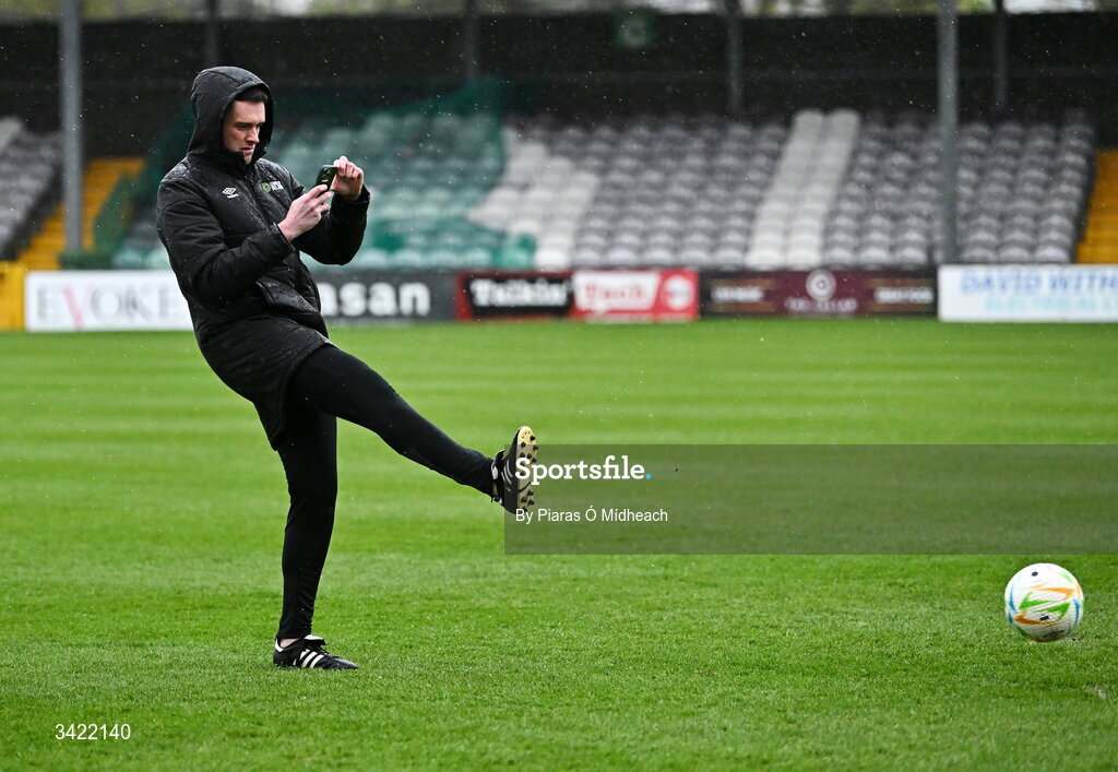 10 April 2026; Referee Rob Hennessy kicks a footall as he inspects the wet pitch before the SSE Airtricity Men's Premier Division match between Galway United and Shelbourne at Eamonn Deacy Park in Galway. Photo by Piaras Ó Mídheach/Sportsfile