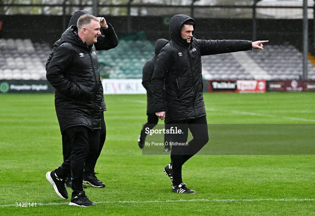 10 April 2026; Referee Rob Hennessy, right, alongside fourth official Mark Houlihan, front, as they after inspect the wet pitch before the SSE Airtricity Men's Premier Division match between Galway United and Shelbourne at Eamonn Deacy Park in Galway. Photo by Piaras Ó Mídheach/Sportsfile