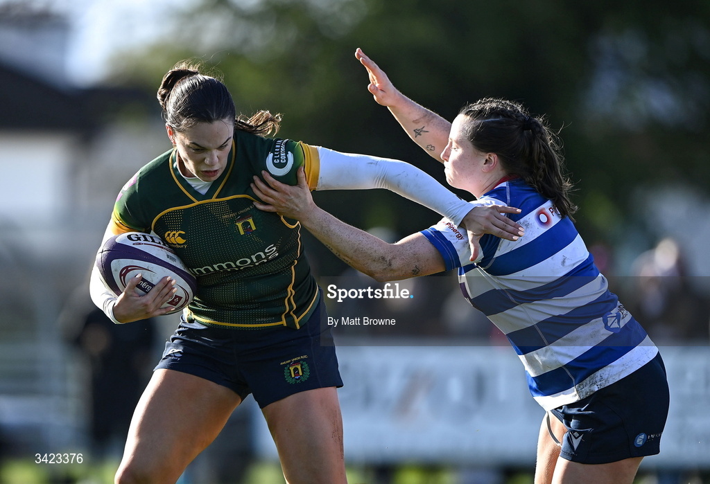 11 April 2026; Leah Tarpey of Railway Union is tackled by Meabh Deely of  Blackrock College during the Energia Women's All-Ireland League semi-final match between Blackrock College and Railway Union at Stradbrook Road in Dublin. Photo by Matt Browne/Sportsfile