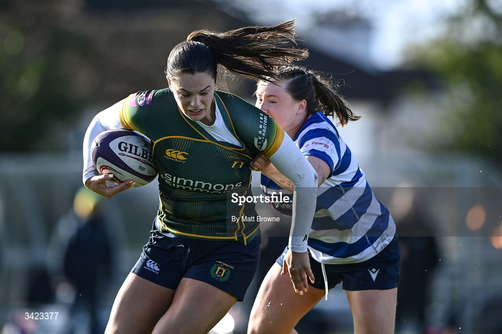 11 April 2026; Leah Tarpey of Railway Union is tackled by Meabh Deely of  Blackrock College during the Energia Women's All-Ireland League semi-final match between Blackrock College and Railway Union at Stradbrook Road in Dublin. Photo by Matt Browne/Sportsfile