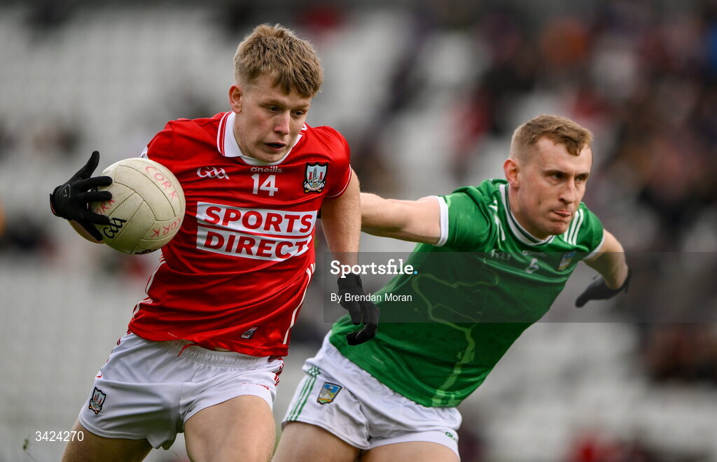 12 April 2026; Dara Sheedy of Cork in action against Killian Ryan of Limerick during the Munster GAA Football Senior Championship quarter-final match between Cork and Limerick at SuperValu Páirc Uí Chaoimh in Cork. Photo by Brendan Moran/Sportsfile
