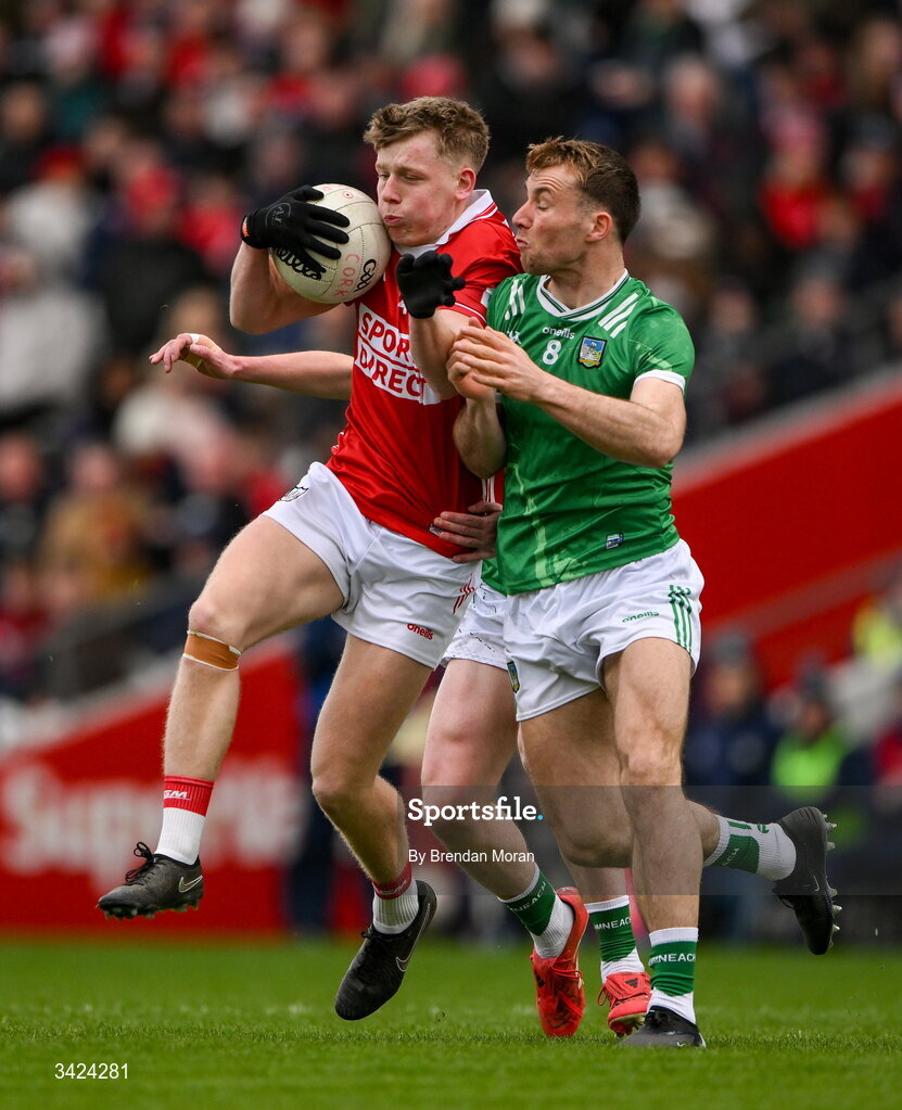12 April 2026; Dara Sheedy of Cork is tackled by Eliah Riordan of Limerick during the Munster GAA Football Senior Championship quarter-final match between Cork and Limerick at SuperValu Páirc Uí Chaoimh in Cork. Photo by Brendan Moran/Sportsfile