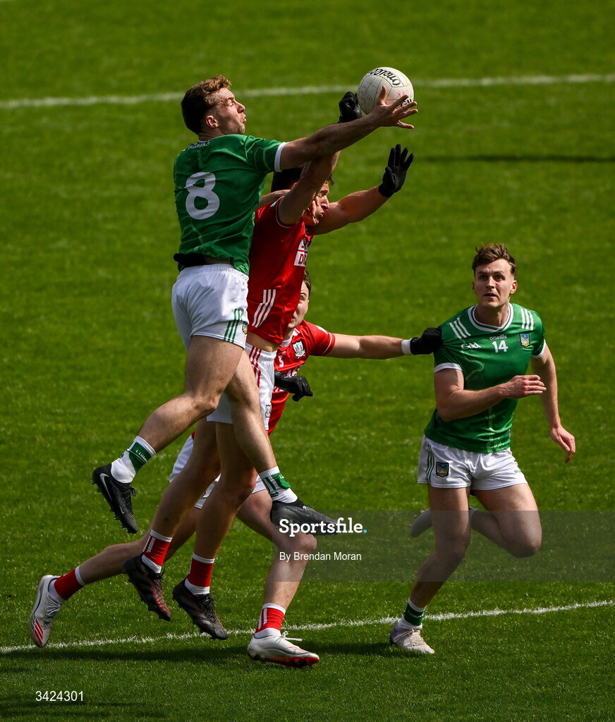 12 April 2026; Eliah Riordan of Limerick and Colm O’Callaghan of Cork contest a kickout during the Munster GAA Football Senior Championship quarter-final match between Cork and Limerick at SuperValu Páirc Uí Chaoimh in Cork. Photo by Brendan Moran/Sportsfile