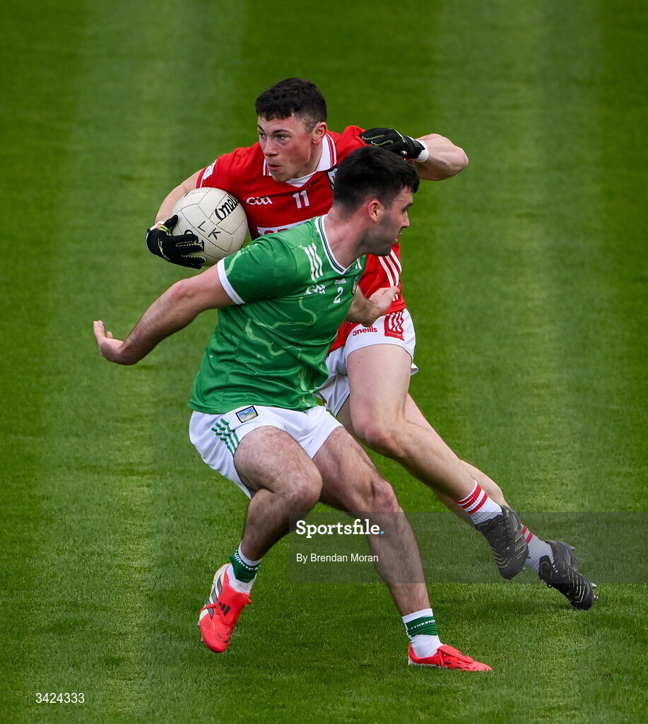 12 April 2026; Mark Cronin of Cork in action against Sean Kilbridge of Limerick during the Munster GAA Football Senior Championship quarter-final match between Cork and Limerick at SuperValu Páirc Uí Chaoimh in Cork. Photo by Brendan Moran/Sportsfile