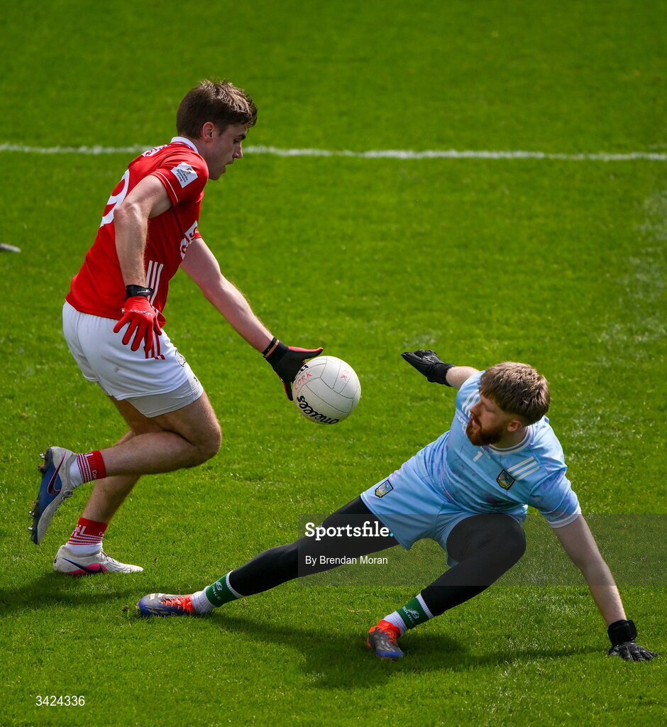 12 April 2026; Ian Maguire of Cork goes around Limerick goalkeeper Jeffrey Alfred on the way to scoring his side's fourth goal during the Munster GAA Football Senior Championship quarter-final match between Cork and Limerick at SuperValu Páirc Uí Chaoimh in Cork. Photo by Brendan Moran/Sportsfile