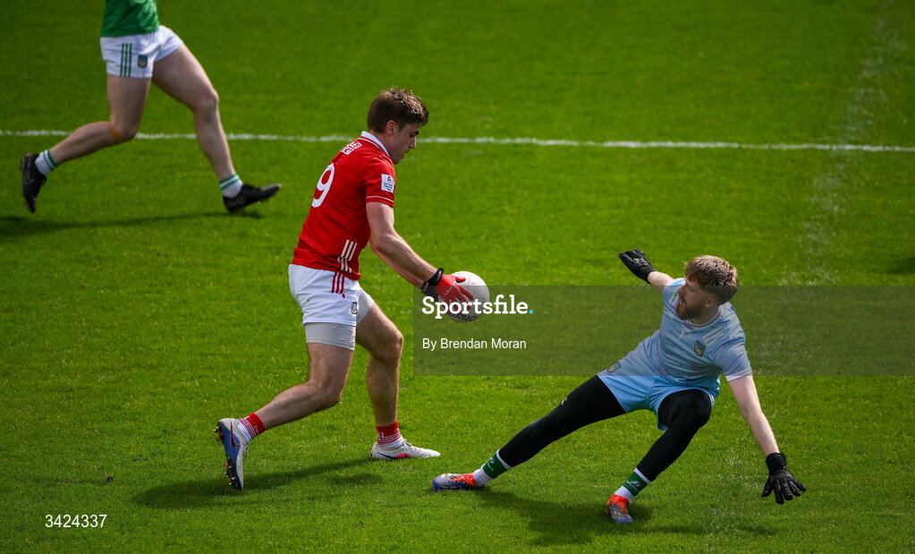 12 April 2026; Ian Maguire of Cork goes around Limerick goalkeeper Jeffrey Alfred on the way to scoring his side's fourth goal during the Munster GAA Football Senior Championship quarter-final match between Cork and Limerick at SuperValu Páirc Uí Chaoimh in Cork. Photo by Brendan Moran/Sportsfile