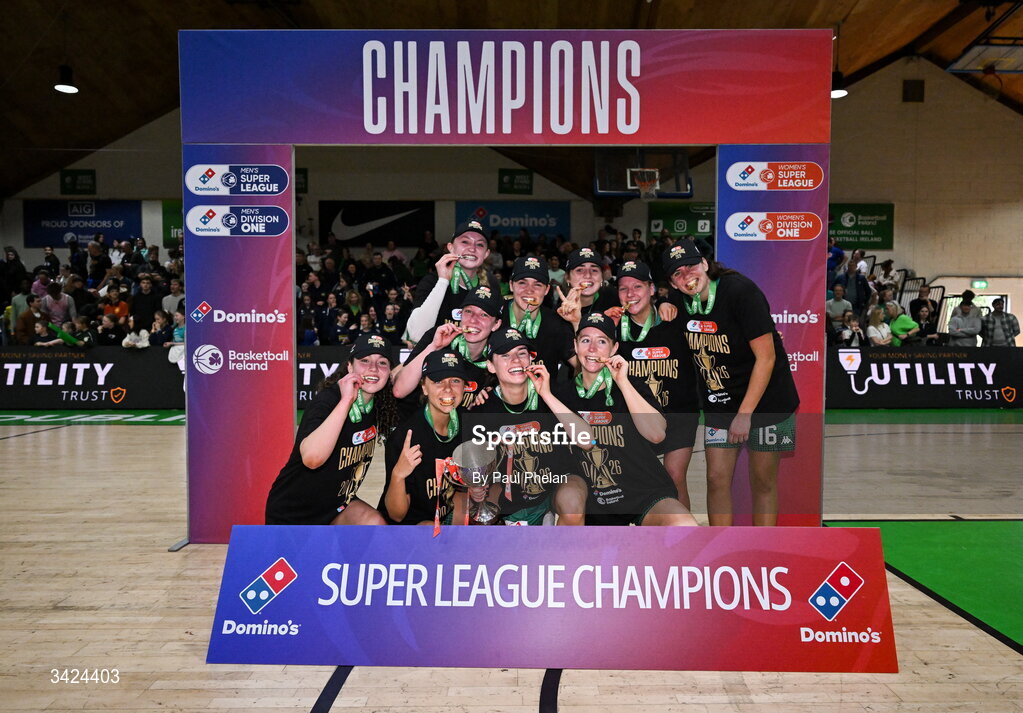 12 April 2026; Trinity Meteors celebrate with the cup after the Basketball Ireland Women's Superleague final match between Trinity Meteors and UCC Glanmire at the National Basketball Arena in Tallaght, Dublin. Photo by Paul Phelan/Sportsfile