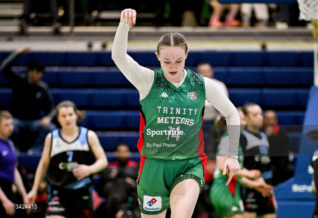 12 April 2026; Ava Learn of Trinity Meteors celebrates a basket during the Basketball Ireland Women's Superleague final match between Trinity Meteors and UCC Glanmire at the National Basketball Arena in Tallaght, Dublin. Photo by Paul Phelan/Sportsfile