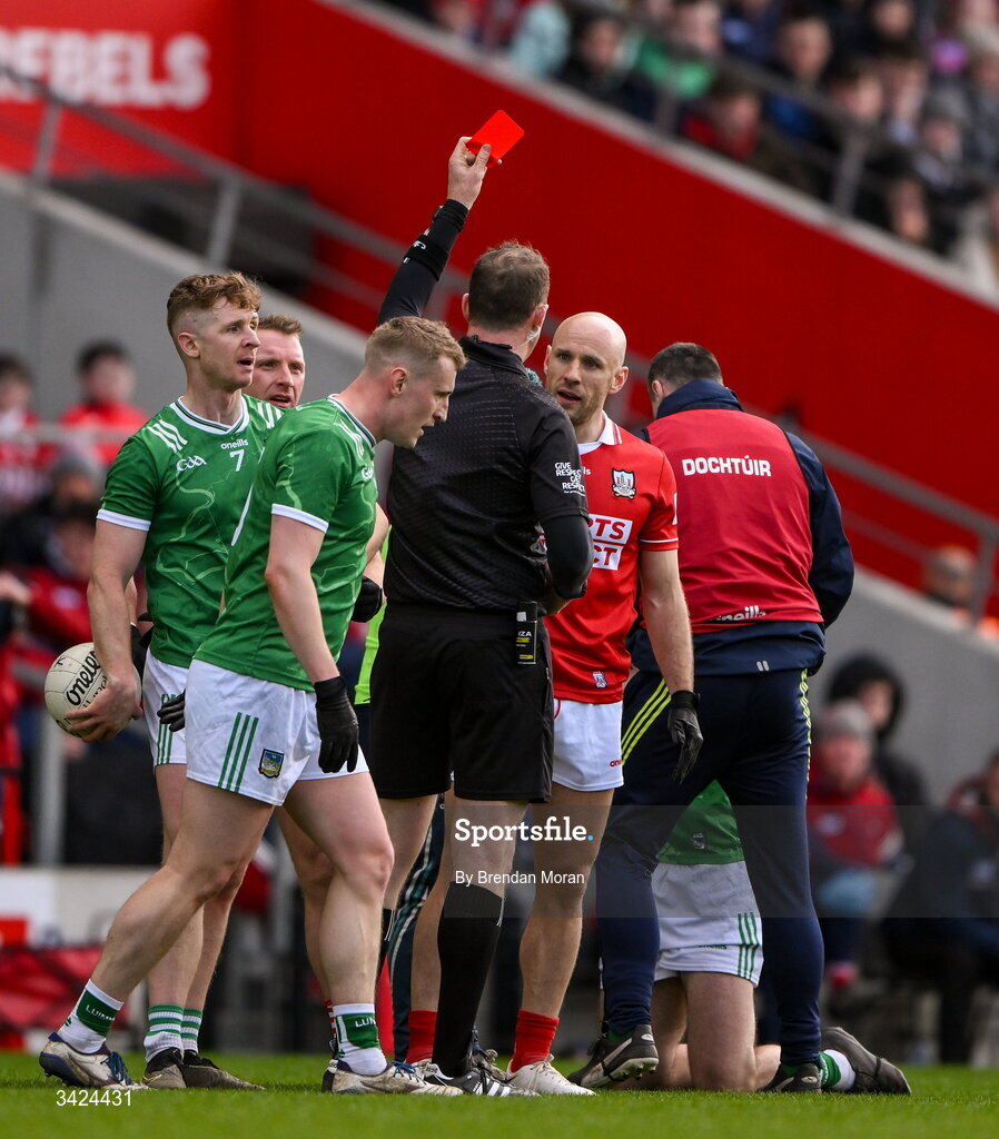 12 April 2026; Brian O’Driscoll of Cork is shown a rd card by referee Séamus Mulhare, after being shown a yellow card, during the Munster GAA Football Senior Championship quarter-final match between Cork and Limerick at SuperValu Páirc Uí Chaoimh in Cork. Photo by Brendan Moran/Sportsfile
