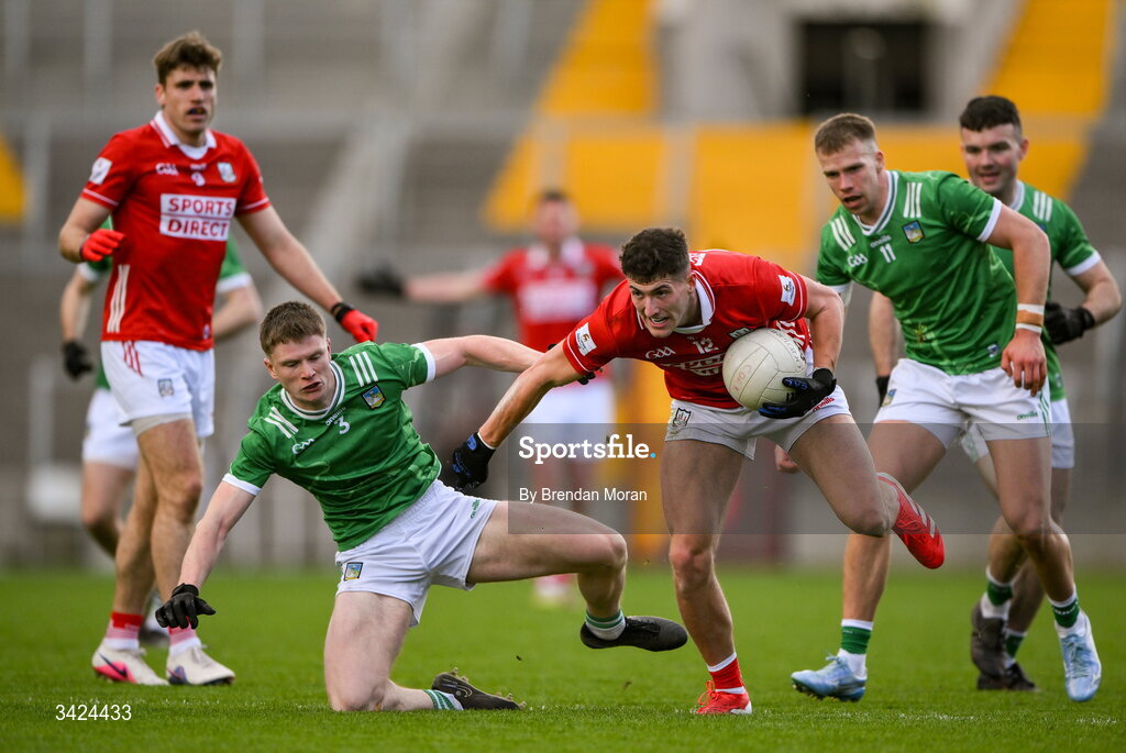 12 April 2026; Seán McDonnell of Cork is tackled by Cormac Woulfe of Limerick during the Munster GAA Football Senior Championship quarter-final match between Cork and Limerick at SuperValu Páirc Uí Chaoimh in Cork. Photo by Brendan Moran/Sportsfile