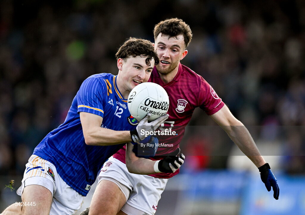 12 April 2026; Daniel Reynolds of Longford in action against Brían Cooney of Westmeath during the Leinster GAA Football Senior Championship Round 1 match between Longford and Westmeath at Glennon Bros Pearse Park in Longford. Photo by Ray McManus/Sportsfile
