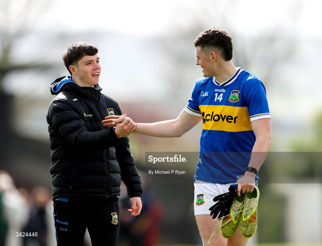 12 April 2026; Sean O'Connor of Tipperary is congratulated by Darragh O'Brien after the Munster GAA Football Senior Championship quarter-final match between Waterford and Tipperary at Cappoquin Logistics Fraher Field in Waterford. Photo by Michael P Ryan/Sportsfile