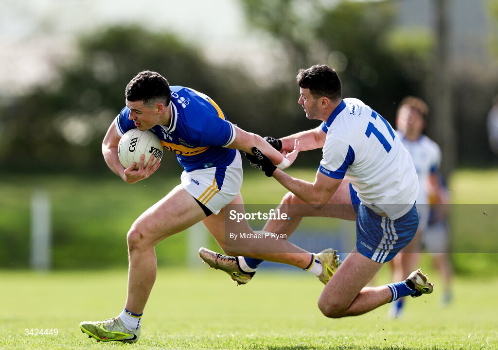 12 April 2026; Sean O'Connor of Tipperary is tackled by Darach O'Cathasaigh of Waterford during the Munster GAA Football Senior Championship quarter-final match between Waterford and Tipperary at Cappoquin Logistics Fraher Field in Waterford. Photo by Michael P Ryan/Sportsfile