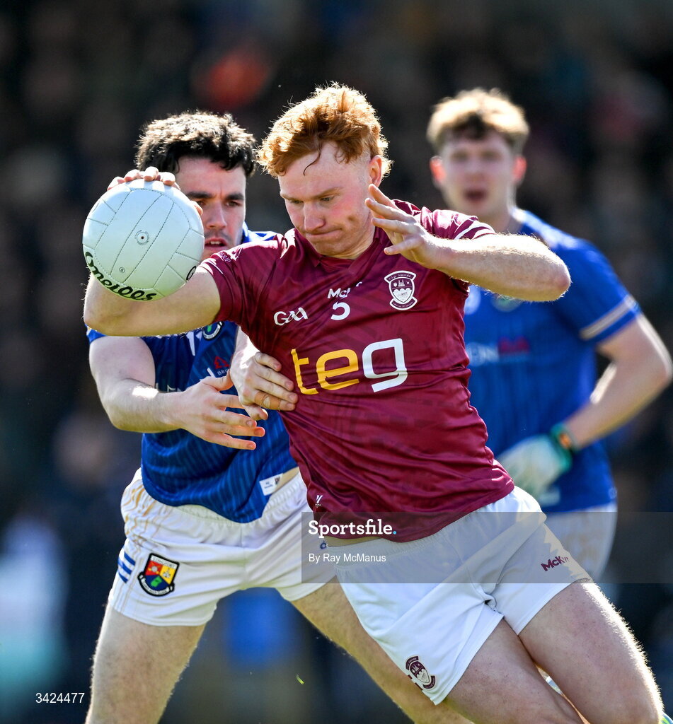 12 April 2026; Ronan Wallace of Westmeath in action against Matthew Carey of Longford during the Leinster GAA Football Senior Championship Round 1 match between Longford and Westmeath at Glennon Bros Pearse Park in Longford. Photo by Ray McManus/Sportsfile
