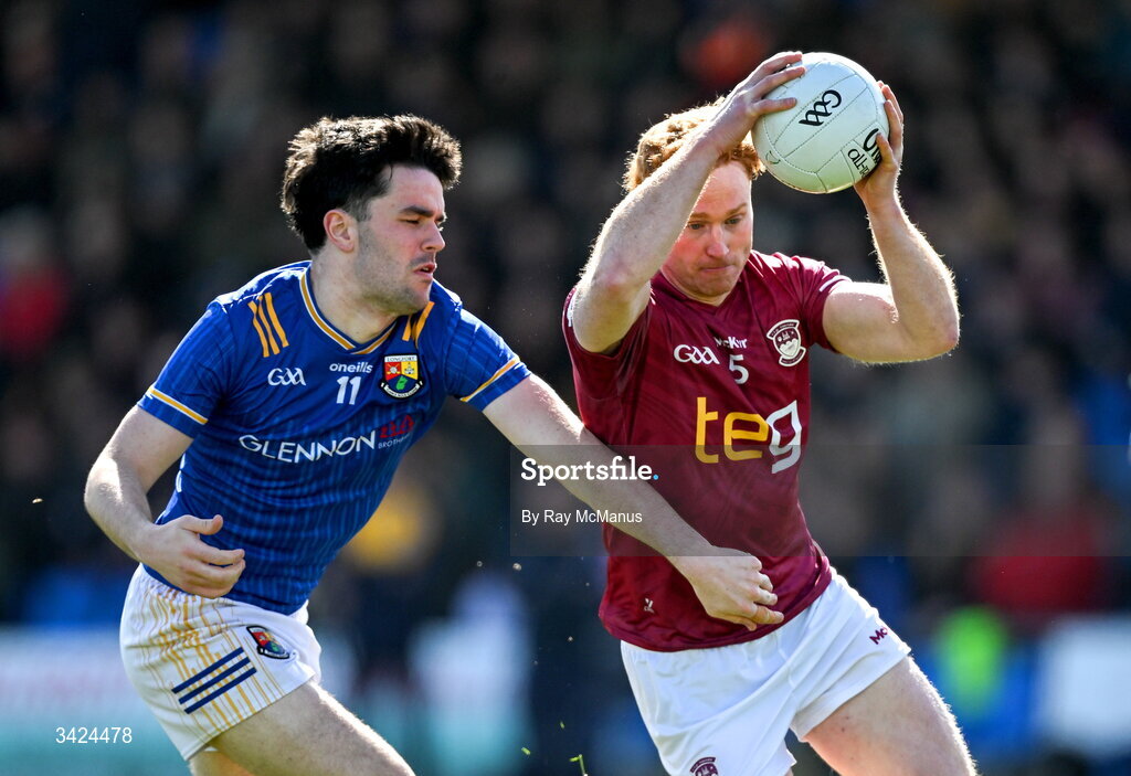 12 April 2026; Ronan Wallace of Westmeath in action against Matthew Carey of Longford during the Leinster GAA Football Senior Championship Round 1 match between Longford and Westmeath at Glennon Bros Pearse Park in Longford. Photo by Ray McManus/Sportsfile