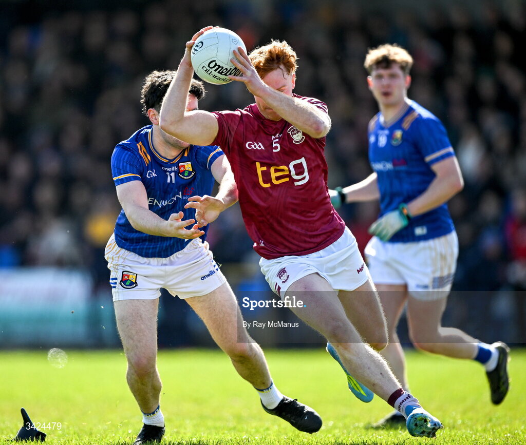 12 April 2026; Ronan Wallace of Westmeath in action against Matthew Carey of Longford during the Leinster GAA Football Senior Championship Round 1 match between Longford and Westmeath at Glennon Bros Pearse Park in Longford. Photo by Ray McManus/Sportsfile
