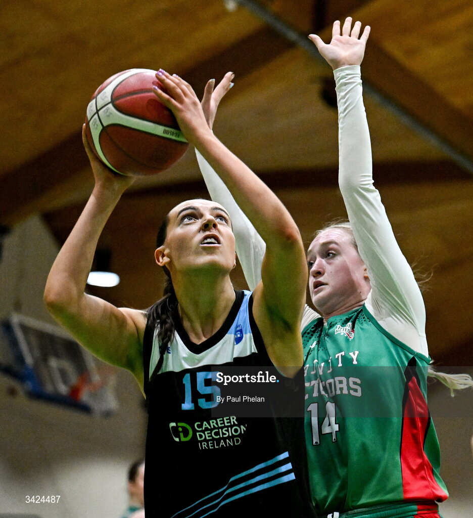 12 April 2026; Emer Dunne of UCC Glanmire in action against Ava Learn of Trinity Meteors during the Basketball Ireland Women's Superleague final match between Trinity Meteors and UCC Glanmire at the National Basketball Arena in Tallaght, Dublin. Photo by Paul Phelan/Sportsfile