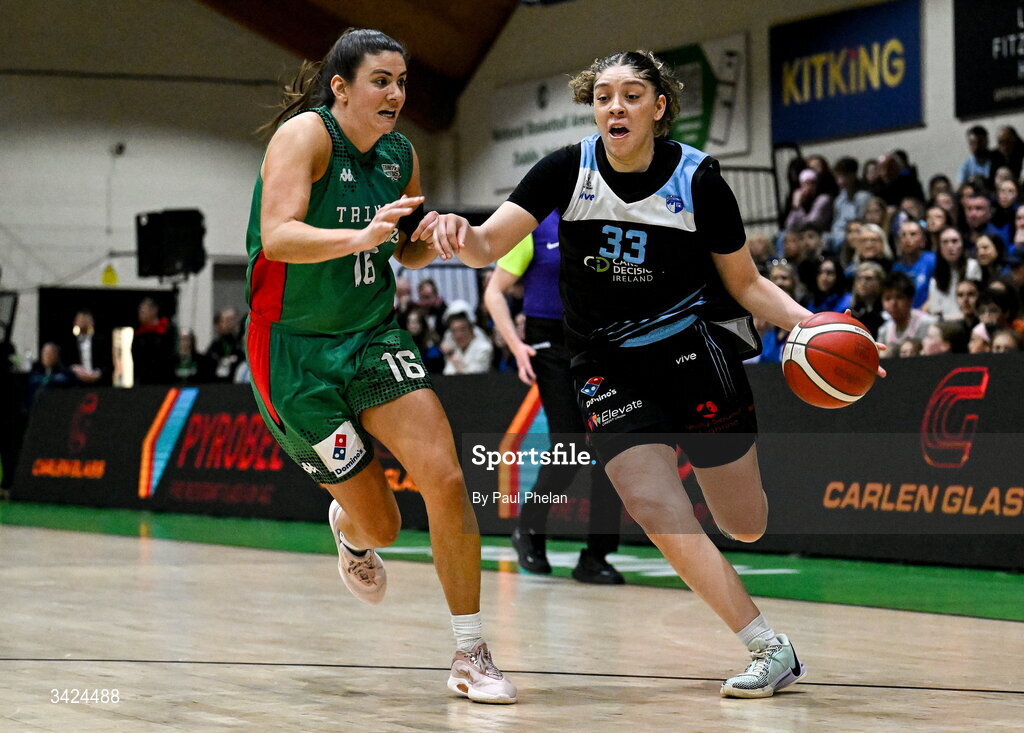 12 April 2026; Kylie Horstmeyer of Trinity Meteors in action against Viane Cumber of UCC Glanmire during the Basketball Ireland Women's Superleague final match between Trinity Meteors and UCC Glanmire at the National Basketball Arena in Tallaght, Dublin. Photo by Paul Phelan/Sportsfile