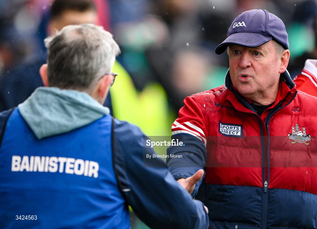 12 April 2026; Cork manager John Cleary, right, shakes hands with Limerick manager Jimmy Lee  after the Munster GAA Football Senior Championship quarter-final match between Cork and Limerick at SuperValu Páirc Uí Chaoimh in Cork. Photo by Brendan Moran/Sportsfile