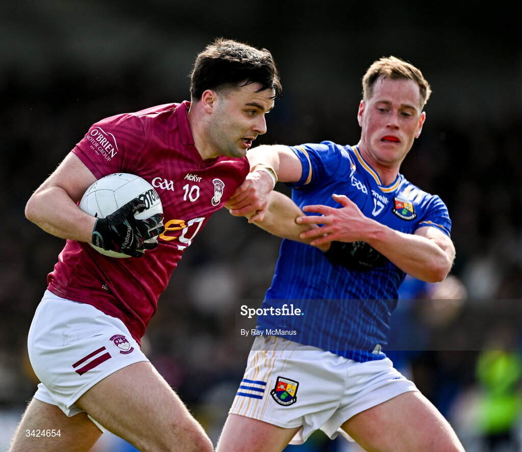 12 April 2026; Kevin O'Sullivan of Westmeath in action against Cian Brady of Longford during the Leinster GAA Football Senior Championship Round 1 match between Longford and Westmeath at Glennon Bros Pearse Park in Longford. Photo by Ray McManus/Sportsfile