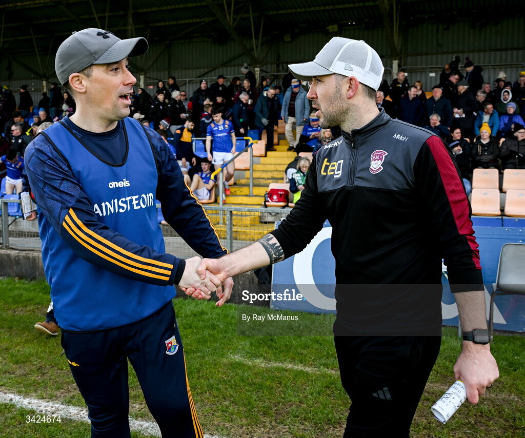 12 April 2026; The Longford manager Mike Solan, left, and Westmeath manager Mark McHugh after the Leinster GAA Football Senior Championship Round 1 match between Longford and Westmeath at Glennon Bros Pearse Park in Longford. Photo by Ray McManus/Sportsfile