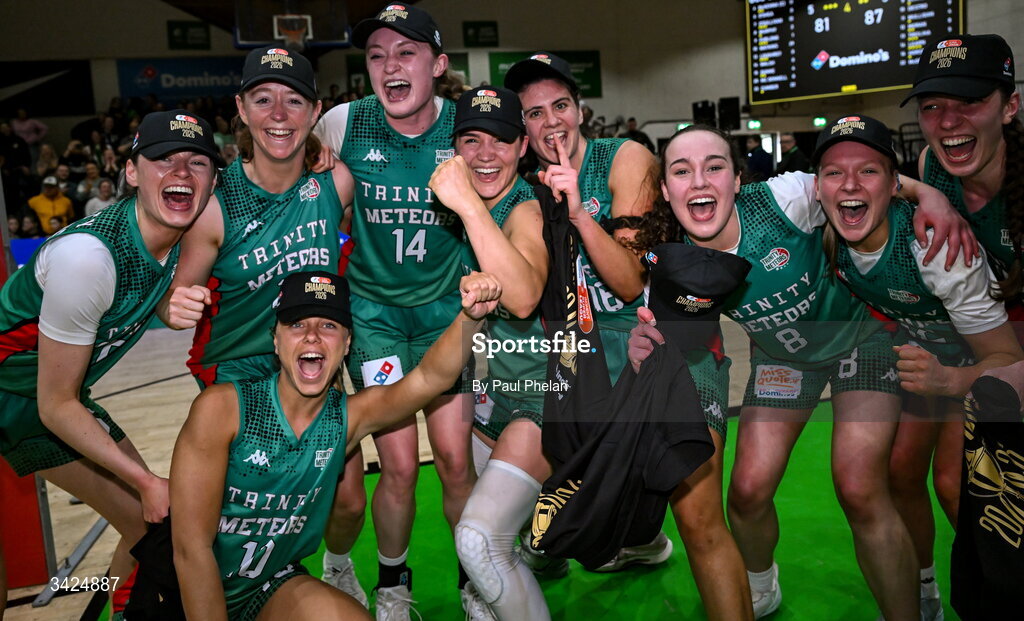 12 April 2026; The Trinity Meteors players celebrate after the Basketball Ireland Women's Superleague final match between Trinity Meteors and UCC Glanmire at the National Basketball Arena in Tallaght, Dublin. Photo by Paul Phelan/Sportsfile