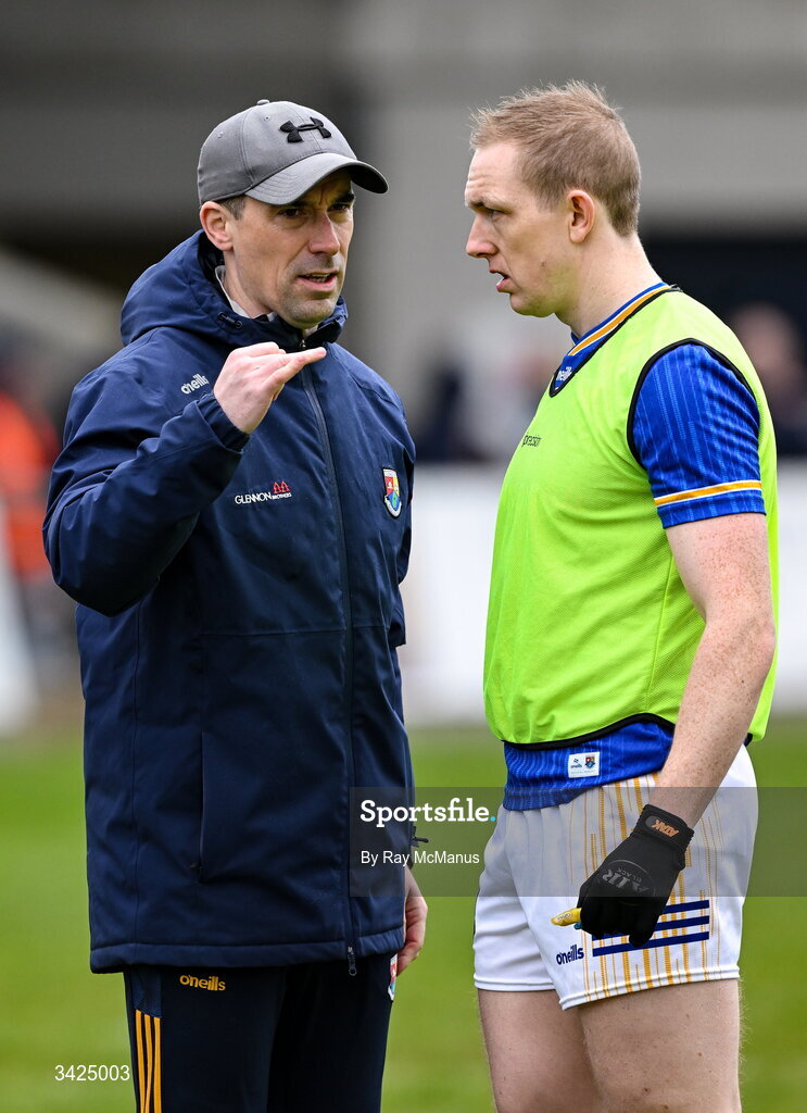 12 April 2026; Longford manager Mike Solan talks to Patrick Fox before the Leinster GAA Football Senior Championship Round 1 match between Longford and Westmeath at Glennon Bros Pearse Park in Longford. Photo by Ray McManus/Sportsfile