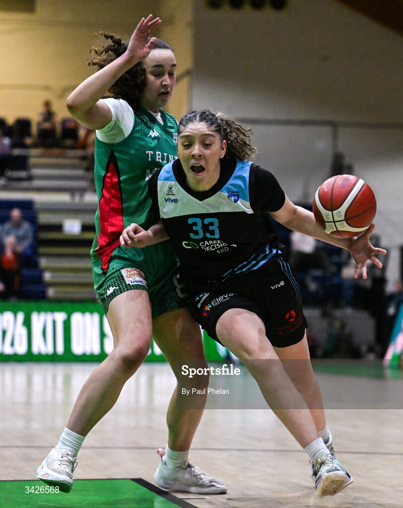 12 April 2026; Viane Cumber of UCC Glanmire in action against Helena Keane of Trinity Meteors during the Basketball Ireland Women's Superleague final match between Trinity Meteors and UCC Glanmire at the National Basketball Arena in Tallaght, Dublin. Photo by Paul Phelan/Sportsfile
