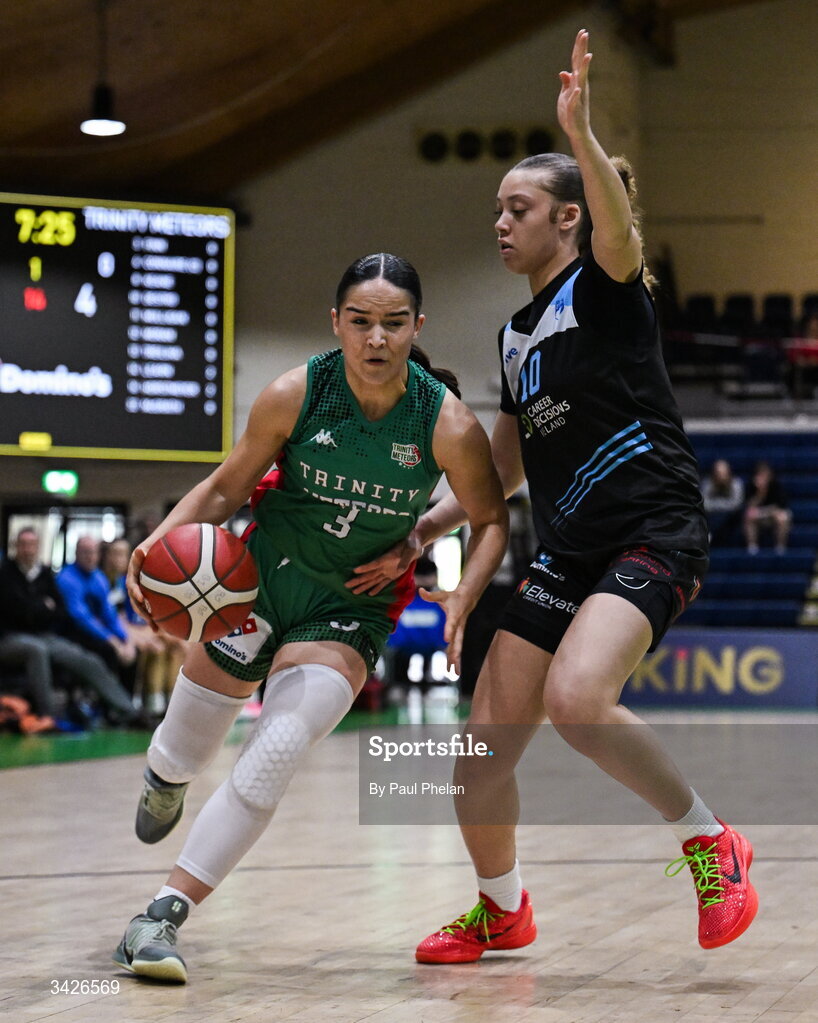 12 April 2026; Hazel Finn of Trinity Meteors in action against Jewel Watkins of UCC Glanmire during the Basketball Ireland Women's Superleague final match between Trinity Meteors and UCC Glanmire at the National Basketball Arena in Tallaght, Dublin. Photo by Paul Phelan/Sportsfile
