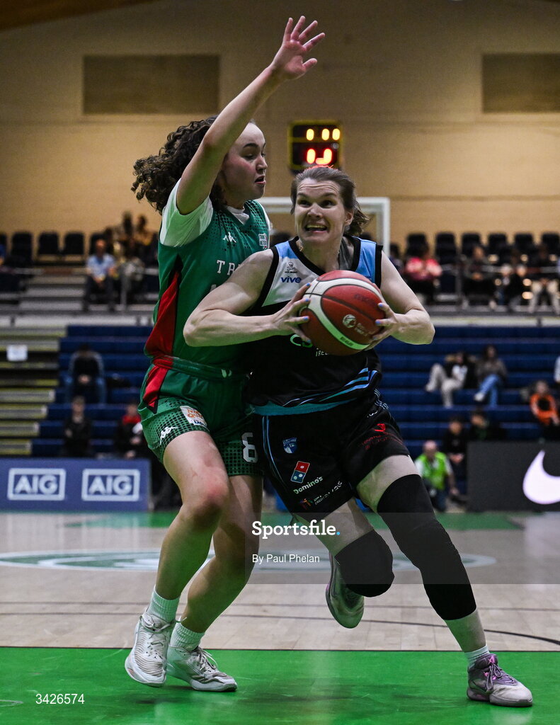 12 April 2026; Claire O'Sullivan of UCC Glanmire in action against Helena Keane of Trinity Meteors during the Basketball Ireland Women's Superleague final match between Trinity Meteors and UCC Glanmire at the National Basketball Arena in Tallaght, Dublin. Photo by Paul Phelan/Sportsfile