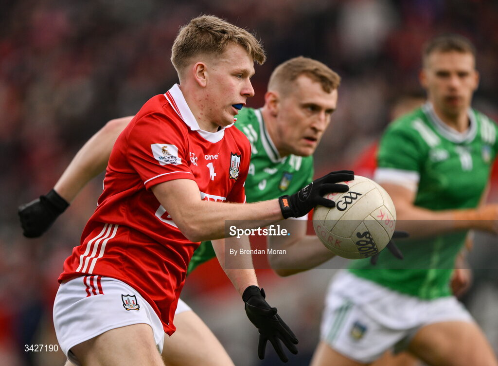 12 April 2026; Dara Sheedy of Cork in action against Killian Ryan of Limerick during the Munster GAA Football Senior Championship quarter-final match between Cork and Limerick at SuperValu Páirc Uí Chaoimh in Cork. Photo by Brendan Moran/Sportsfile