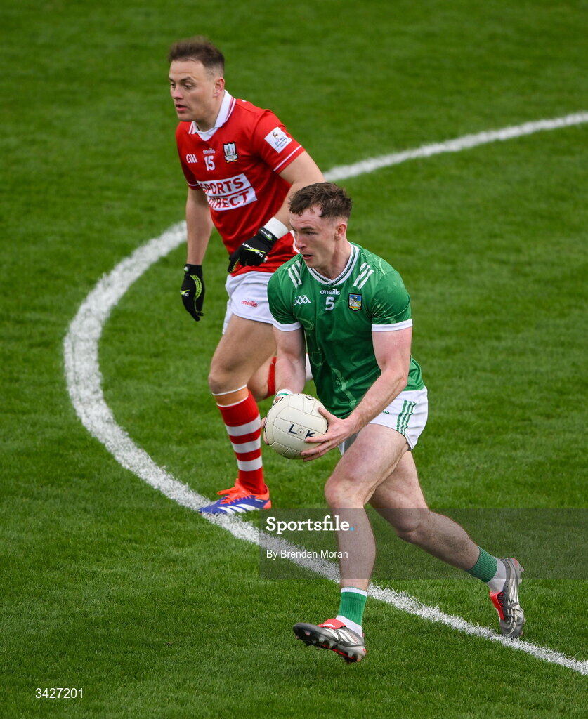 12 April 2026; Barry Coleman of Limerick in action against Steven Sherlock of Cork during the Munster GAA Football Senior Championship quarter-final match between Cork and Limerick at SuperValu Páirc Uí Chaoimh in Cork. Photo by Brendan Moran/Sportsfile