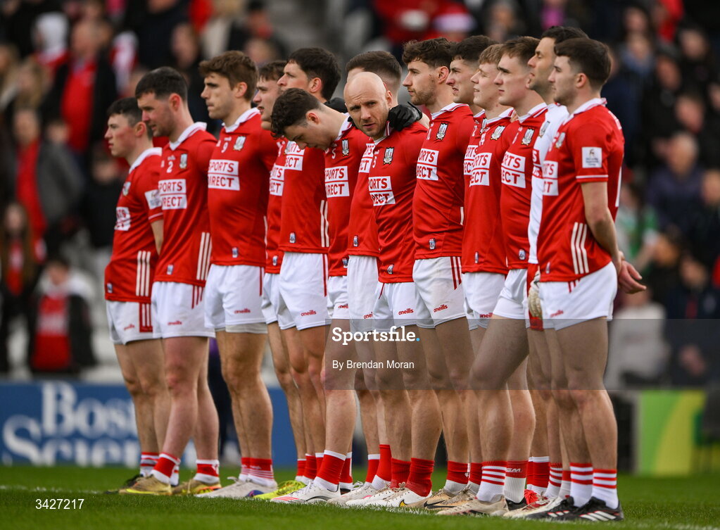 12 April 2026; Brian O’Driscoll of Cork, centre, and his teammates stand for Amhrán na bhFiann before the Munster GAA Football Senior Championship quarter-final match between Cork and Limerick at SuperValu Páirc Uí Chaoimh in Cork. Photo by Brendan Moran/Sportsfile