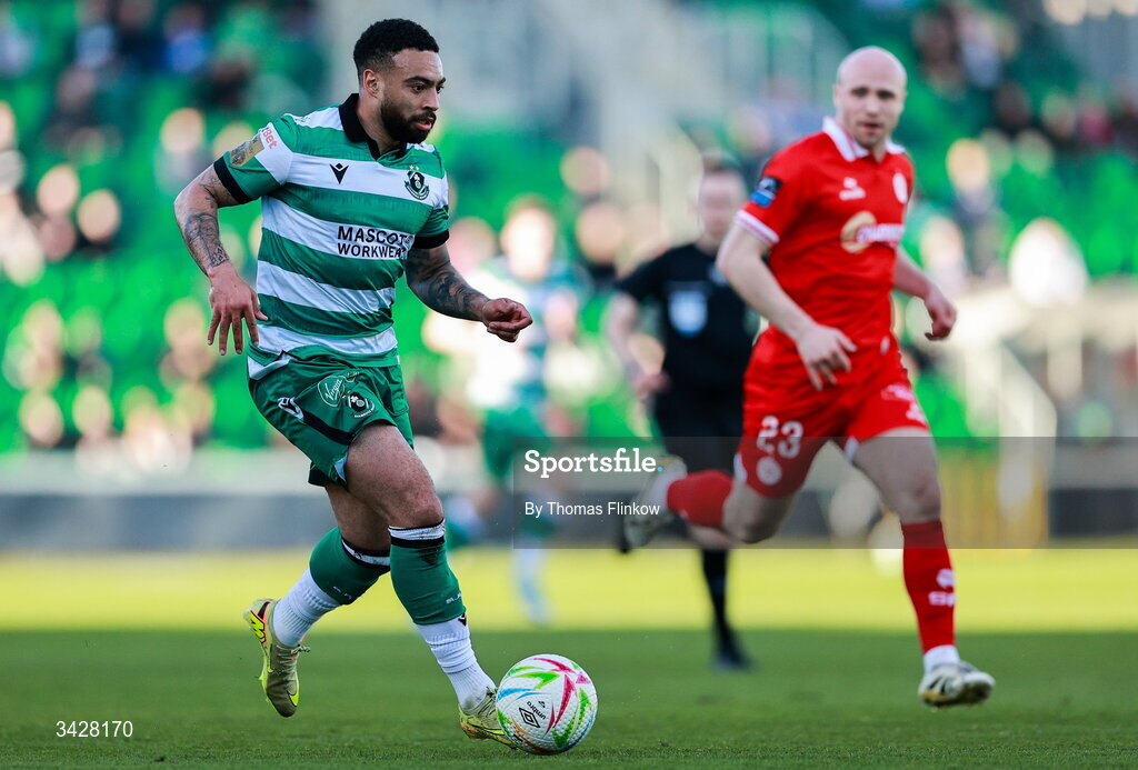 6 April 2026; Jake Mulraney of Shamrock Rovers in action against Kerr McInroy of Shelbourne during the SSE Airtricity Men's Premier Division match between Shamrock Rovers and Shelbourne at Tallaght Stadium in Dublin. Photo by Thomas Flinkow/Sportsfile