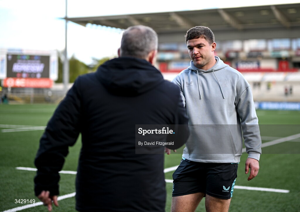 17 April 2026; Scott Penny of Leinster with Ulster head coach Richie Murphy during the United Rugby Championship match between Ulster and Leinster at Affidea Stadium in Belfast. Photo by David Fitzgerald/Sportsfile